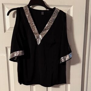 Elegant Black Top with Silver Accents